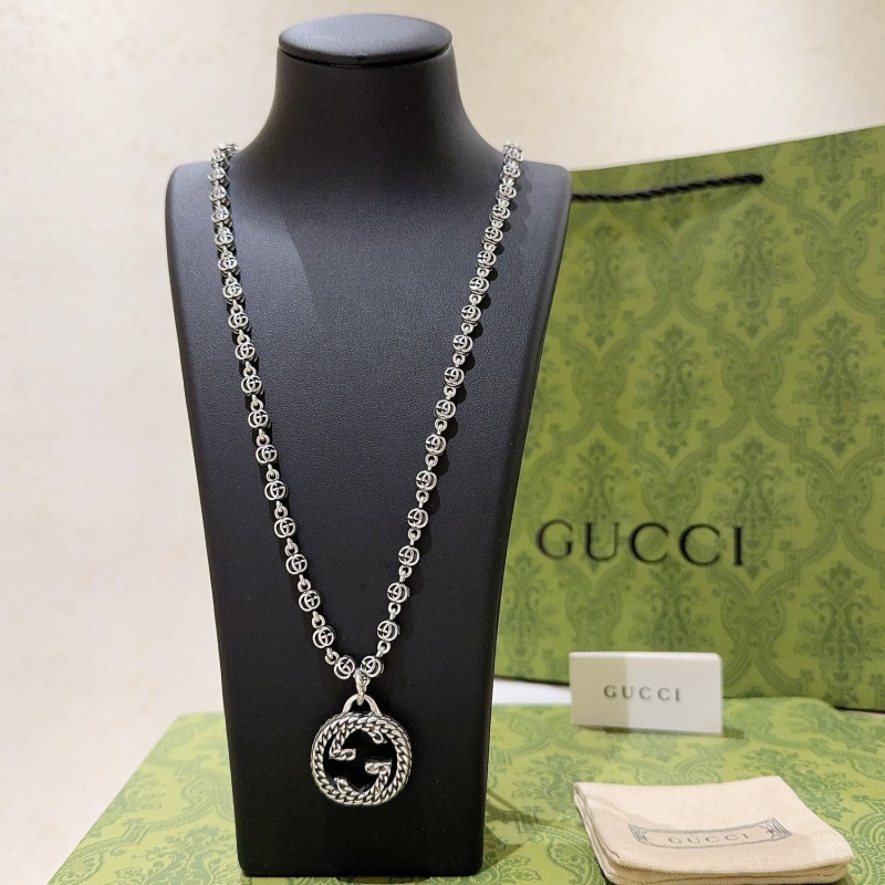 G*u*i necklaces